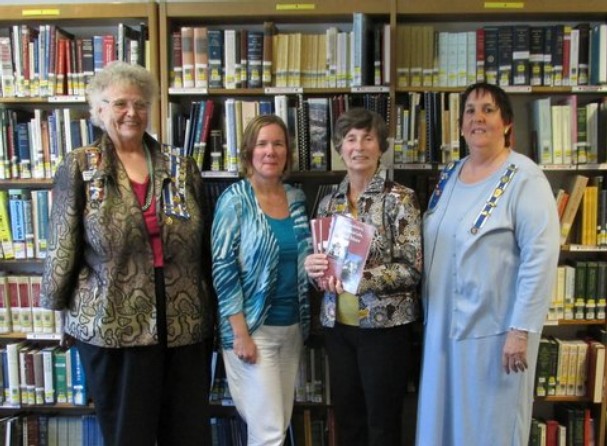 DAR members donating books to Martin County Libraries